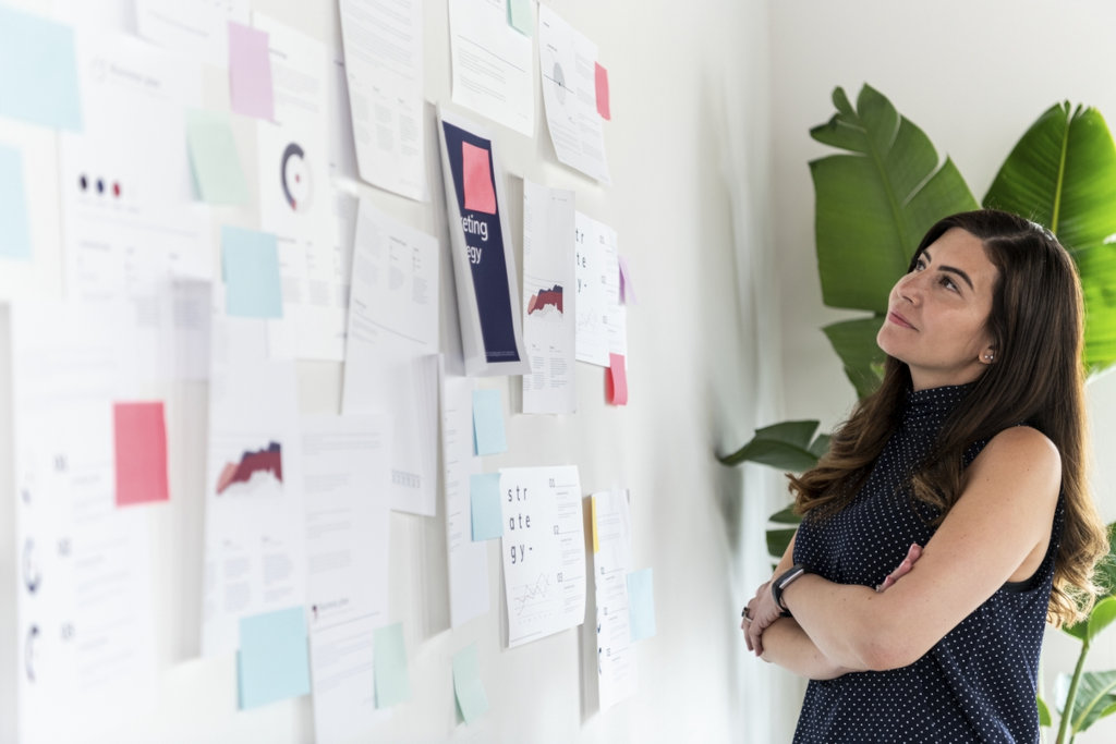 Woman reading information on paperworks