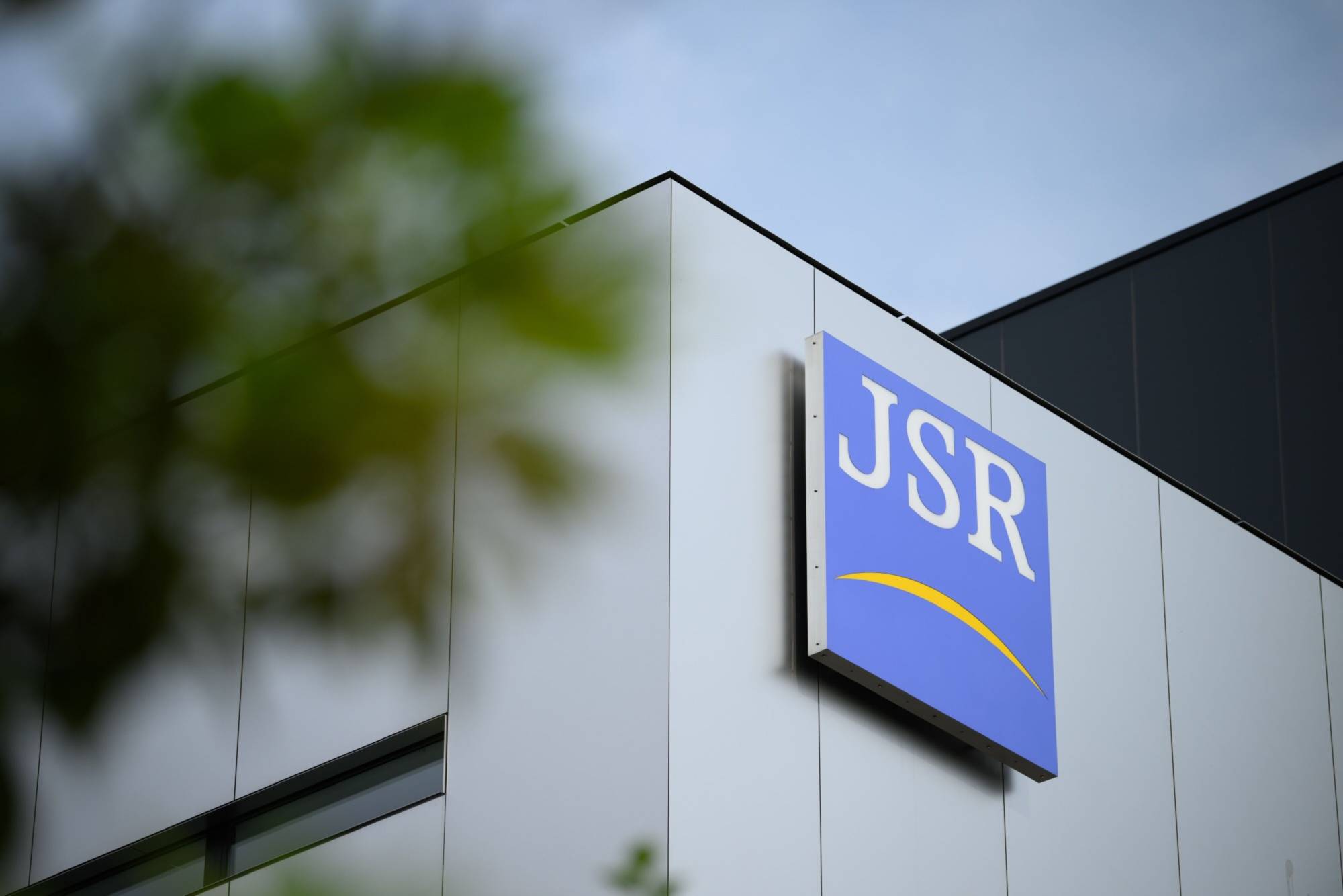 Jsr corp. facility amid $7 billion government buyout talk